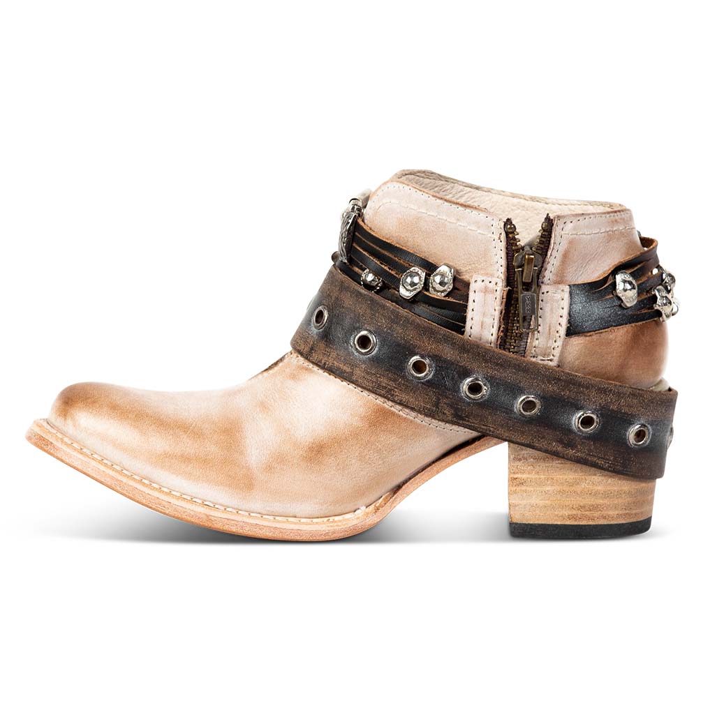 Inside view showing working brass zip closure and embellished western belts on FREEBIRD women's Saloon taupe bootie