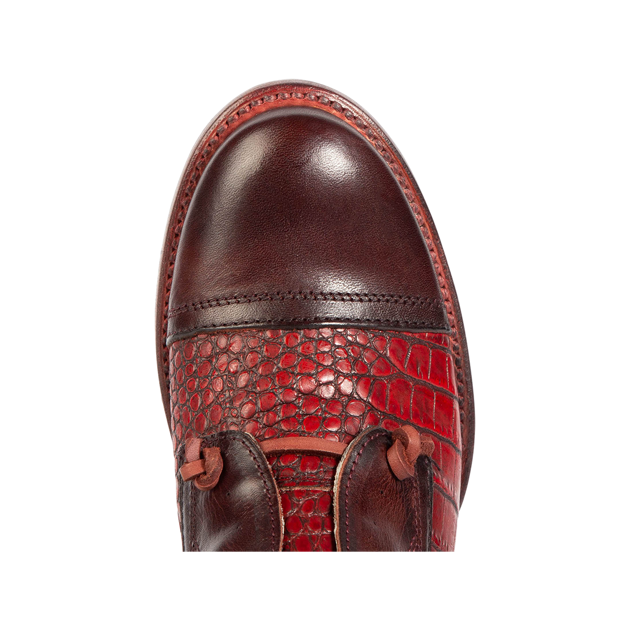 Top view showing almond toe and decorative knotted leather lace on FREEBIRD women's Mabel wine multi shoe