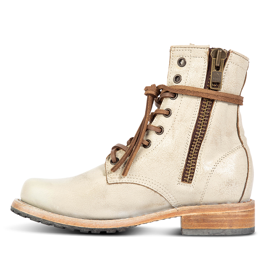 Inside view showing working brass zip closure on FREEBIRD women's Manchester taupe distressed combat boot