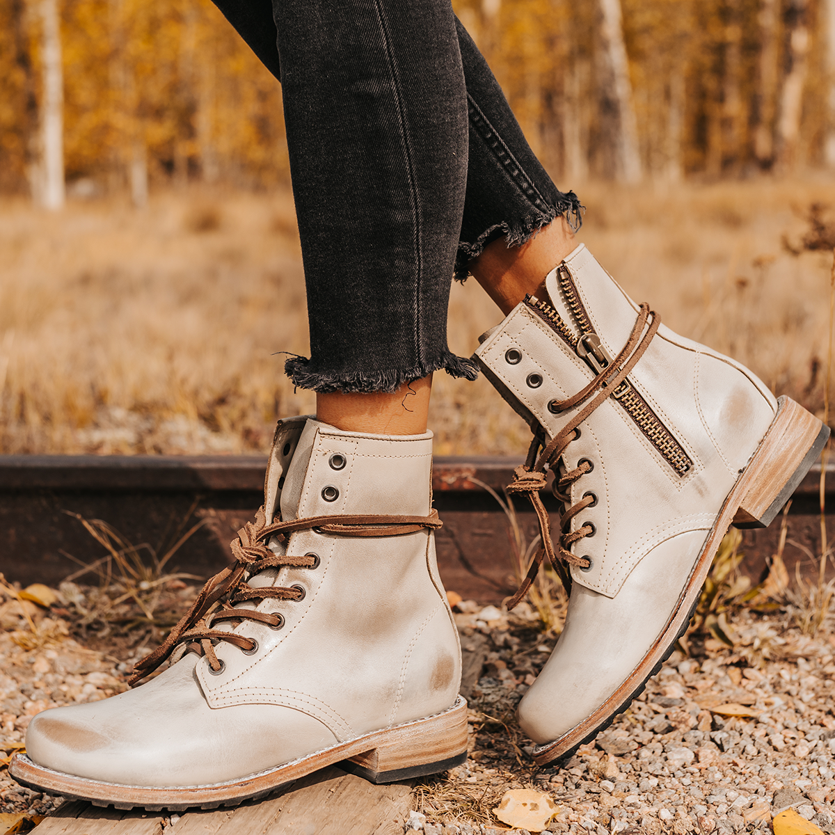 FREEBIRD women's Manchester taupe distressed low heel lace up combat boot with inside zip closure
