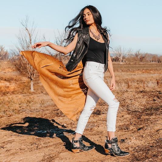 FREEBIRD women's Mayhem black western ankle bootie with exposed sides, adjustable metal buckles, and snip toe lifestyle