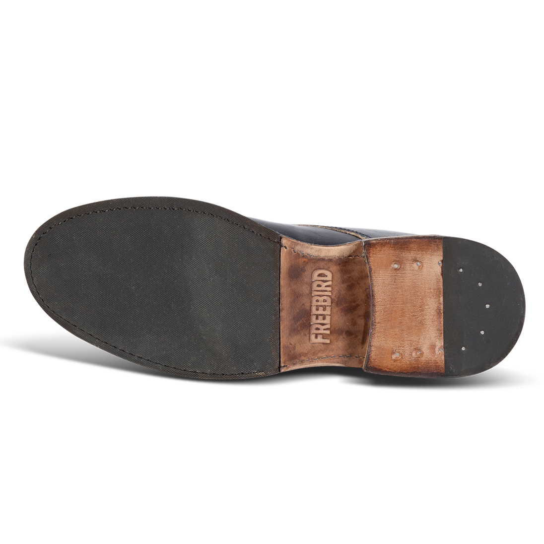 Rubber sole imprinted with FREEBIRD on men's McCoy navy shoe
