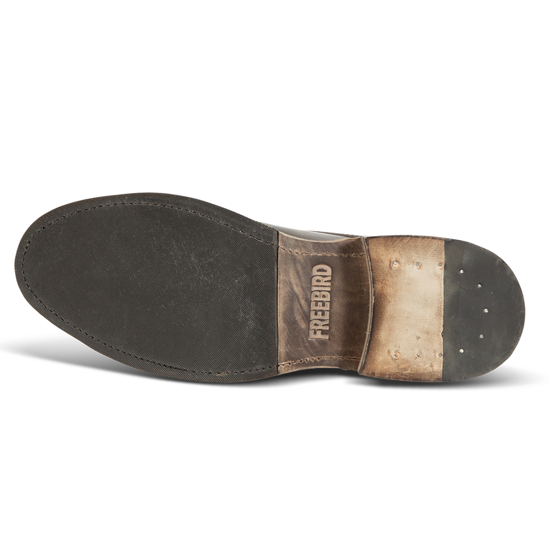 Rubber sole imprinted with FREEBIRD on men's McCoy olive shoe