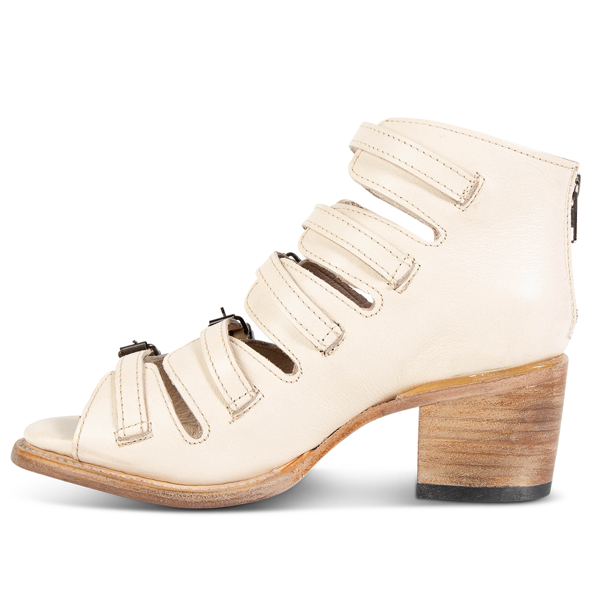 Inside view showing leather straps and stacked heel on FREEBIRD women's Quinn beige sandal