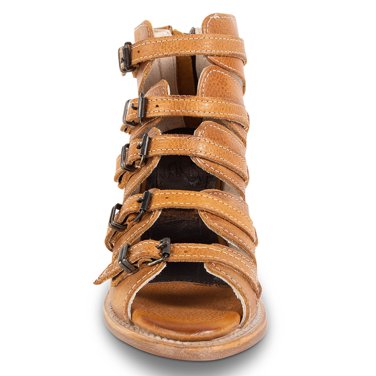 Front view showing buckle cut outs and leather straps on FREEBIRD women's Quinn wheat sandal