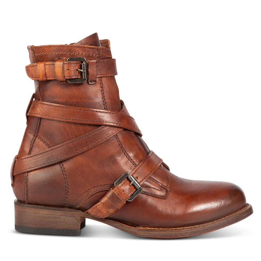FREEBIRD women's Raine cognac full grain leather bootie with inside zip closure, wooden heel, and leather overlays with metal buckles