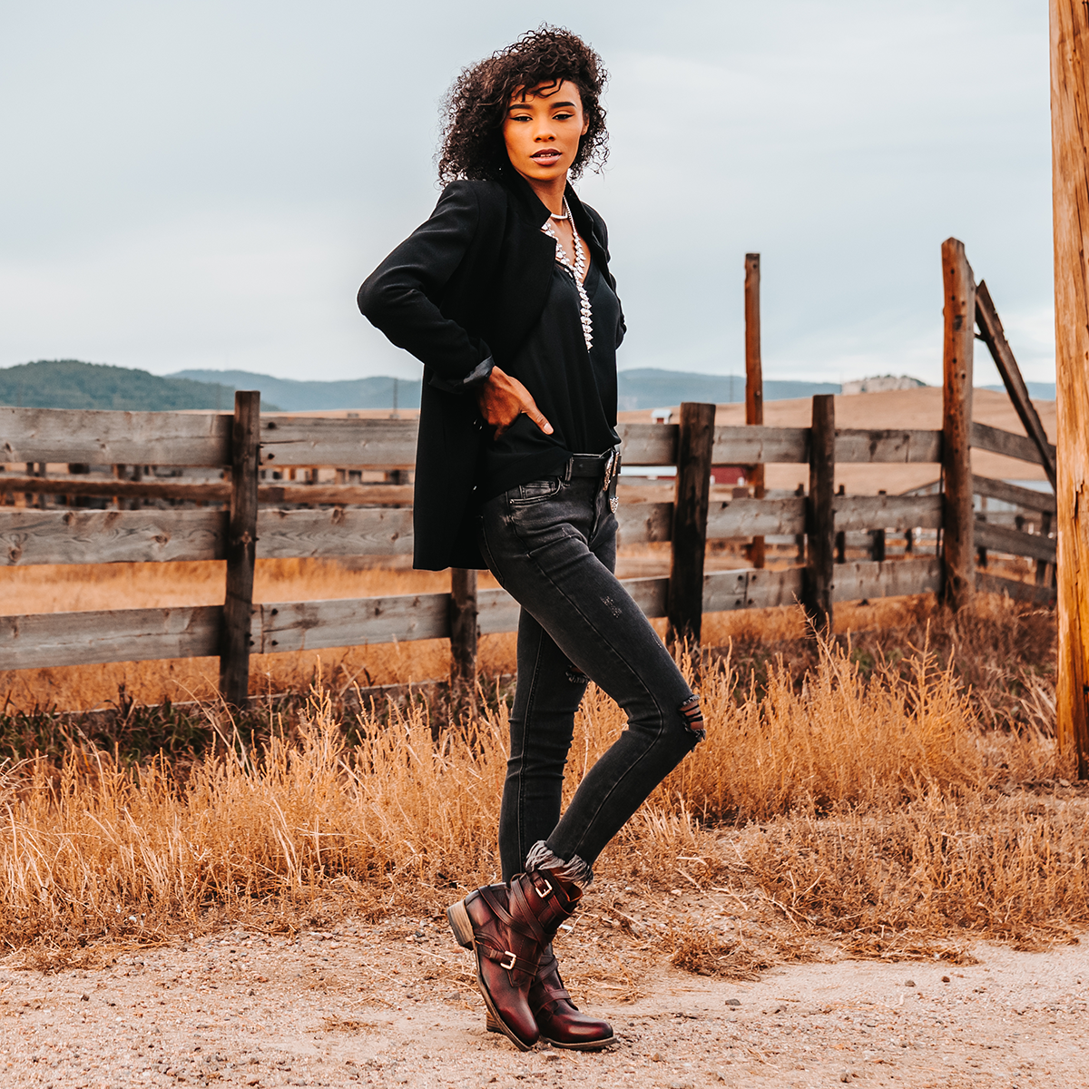 FREEBIRD women's Raine wine full grain leather bootie with inside zip closure, wooden heel, and leather overlays with metal buckles