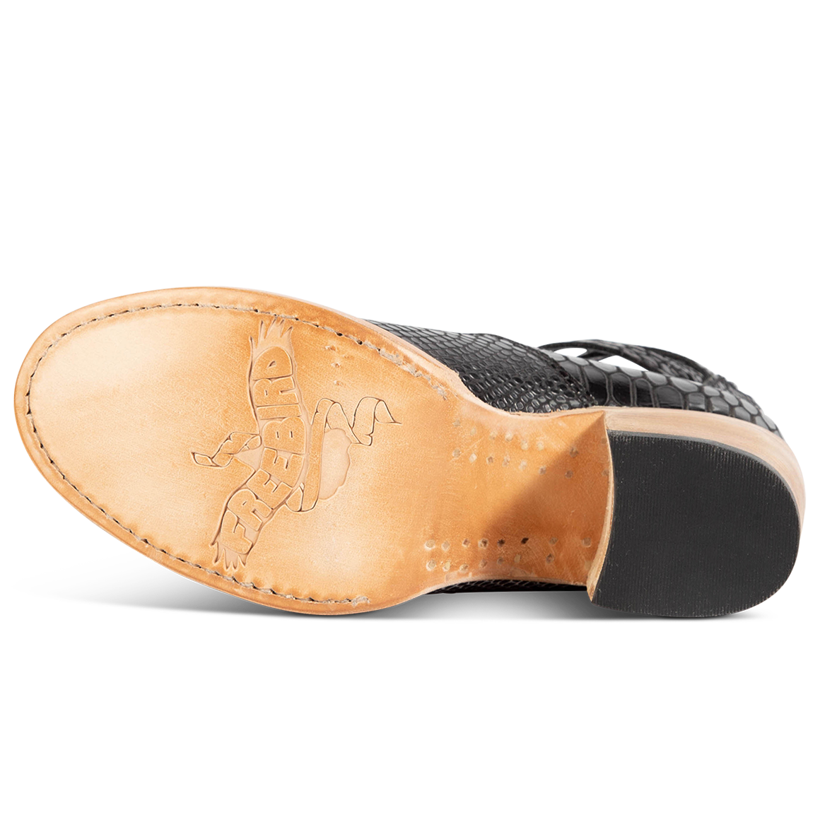 Leather sole imprinted with FREEBIRD on women’s Randi black snake shoe