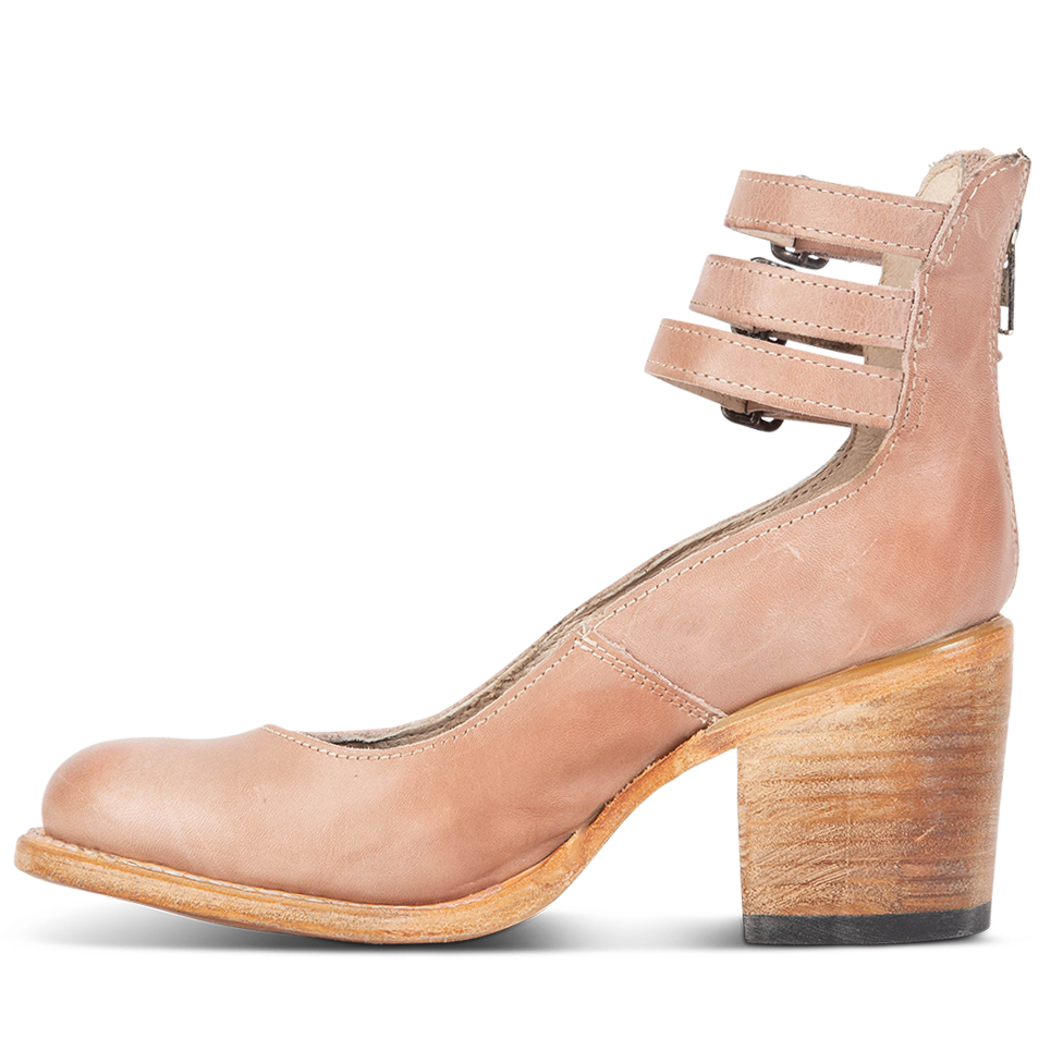 Inside view showing an open construction and wood heel with three adjustable ankle straps on FREEBIRD women’s Randi blush shoe