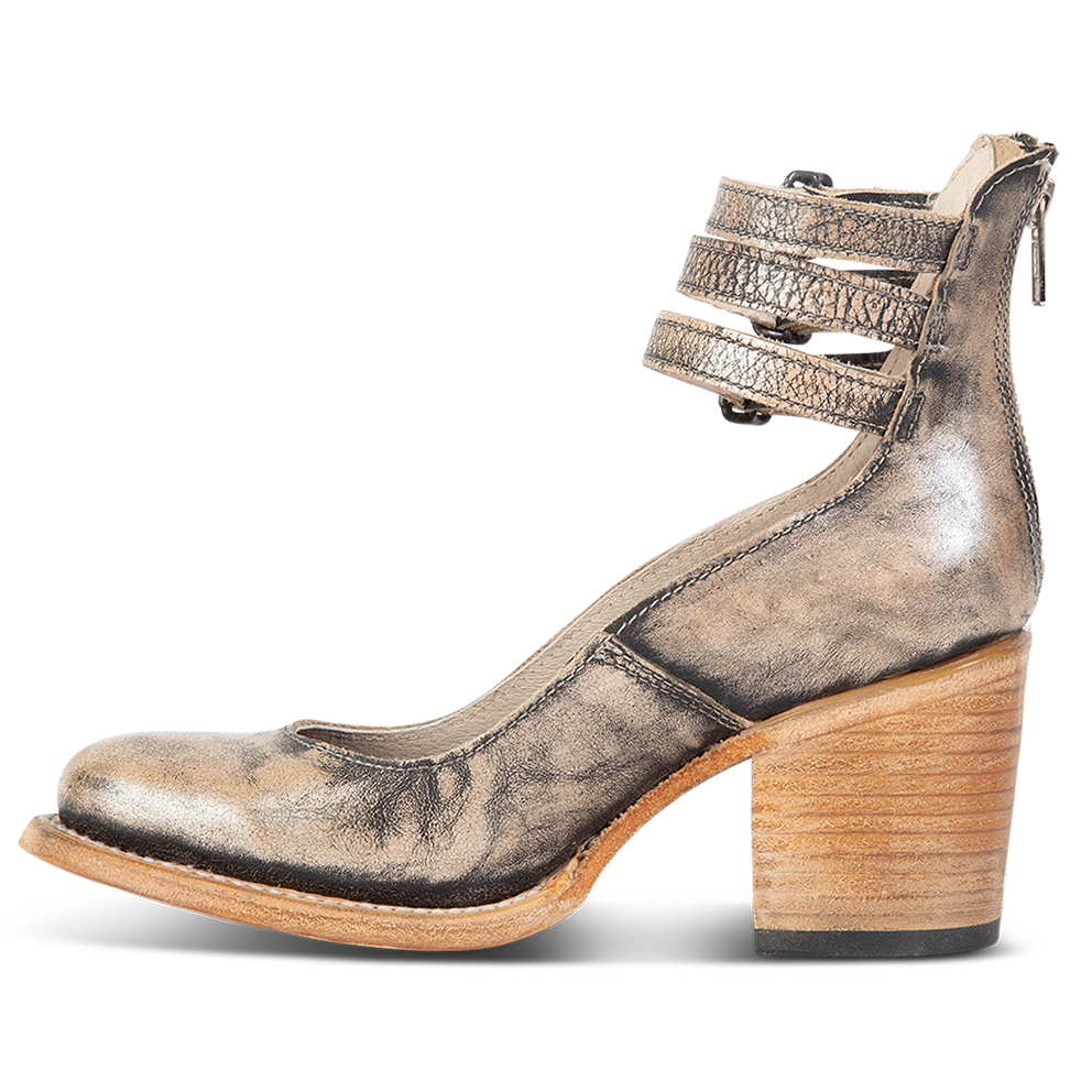 Inside view showing an open construction and wood heel with three adjustable ankle straps on FREEBIRD women’s Randi pewter shoe