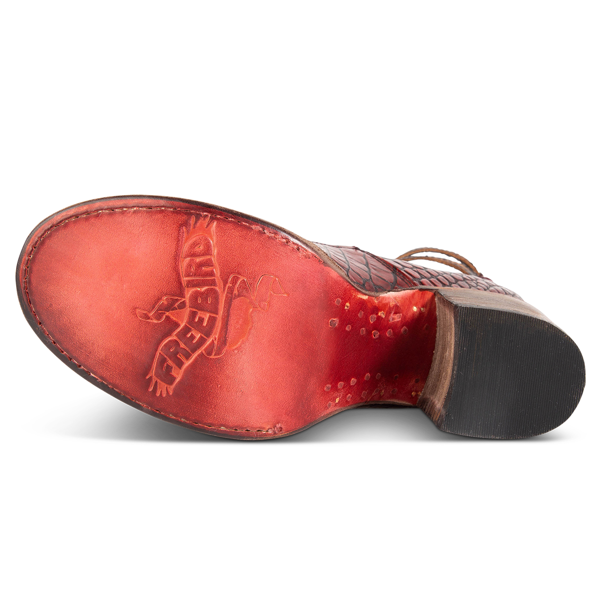Leather sole imprinted with FREEBIRD on women’s Randi red croco leather shoe