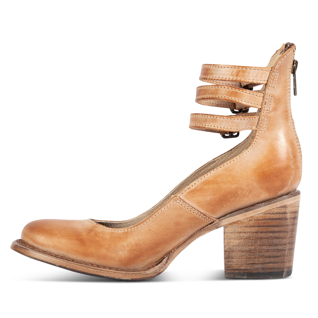 Inside view showing an open construction and wood heel with three adjustable ankle straps on FREEBIRD women’s Randi tan shoe