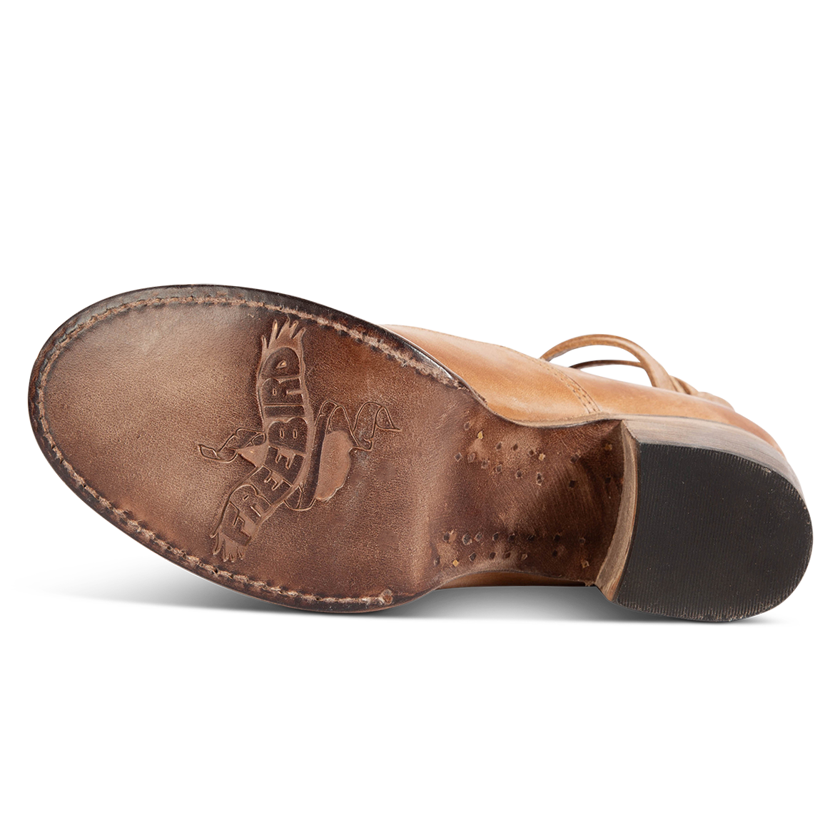 Leather sole imprinted with FREEBIRD on women’s Randi tan shoe