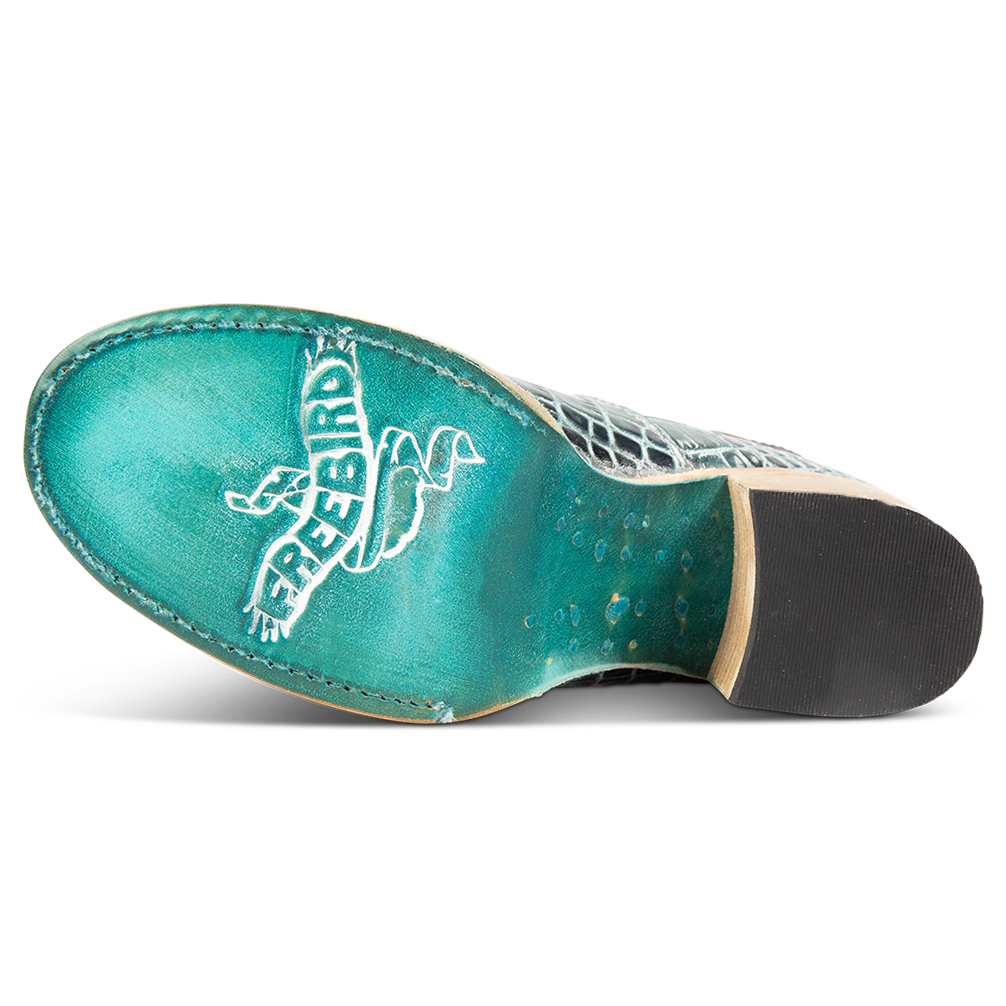 Turquoise leather sole imprinted with FREEBIRD on women’s Randi turquoise croco shoe