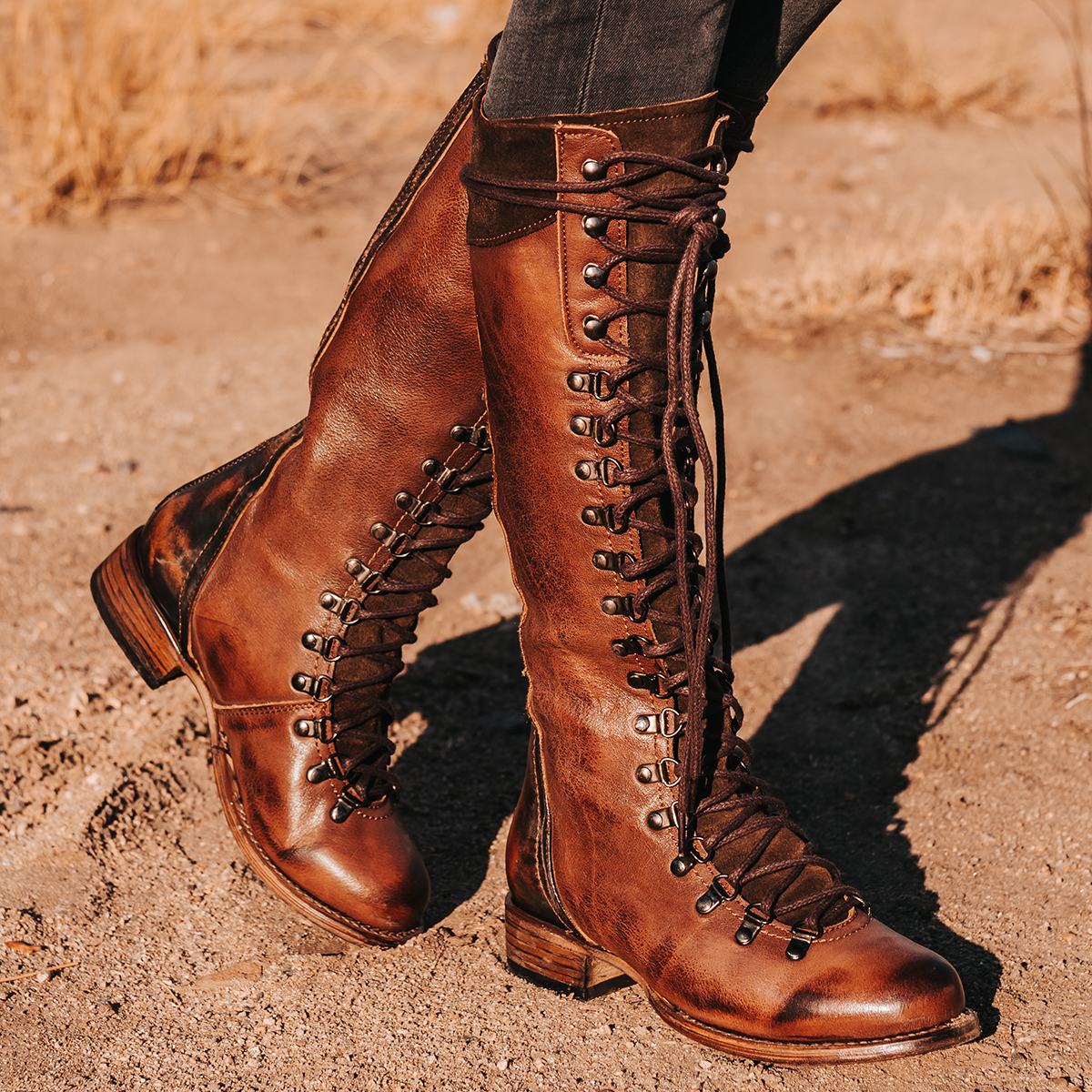 FREEBIRD women's Raphael brown lace up front shaft and eyelet lacing featuring a full back zip closure