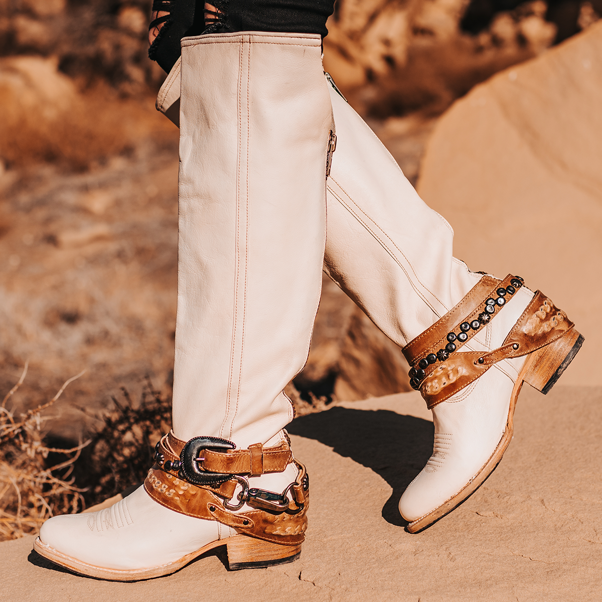 FREEBIRD women's Rodondo beige boot featuring a a relaxed silhouette, low heel, and mixed metal buckles