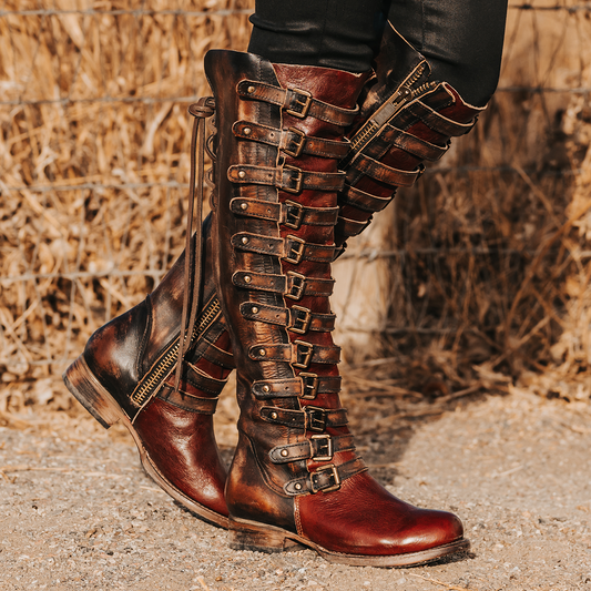 FREEBIRD women's Rylan cognac multi tall boot with inside zip closure back lacing and shaft with brass buckles