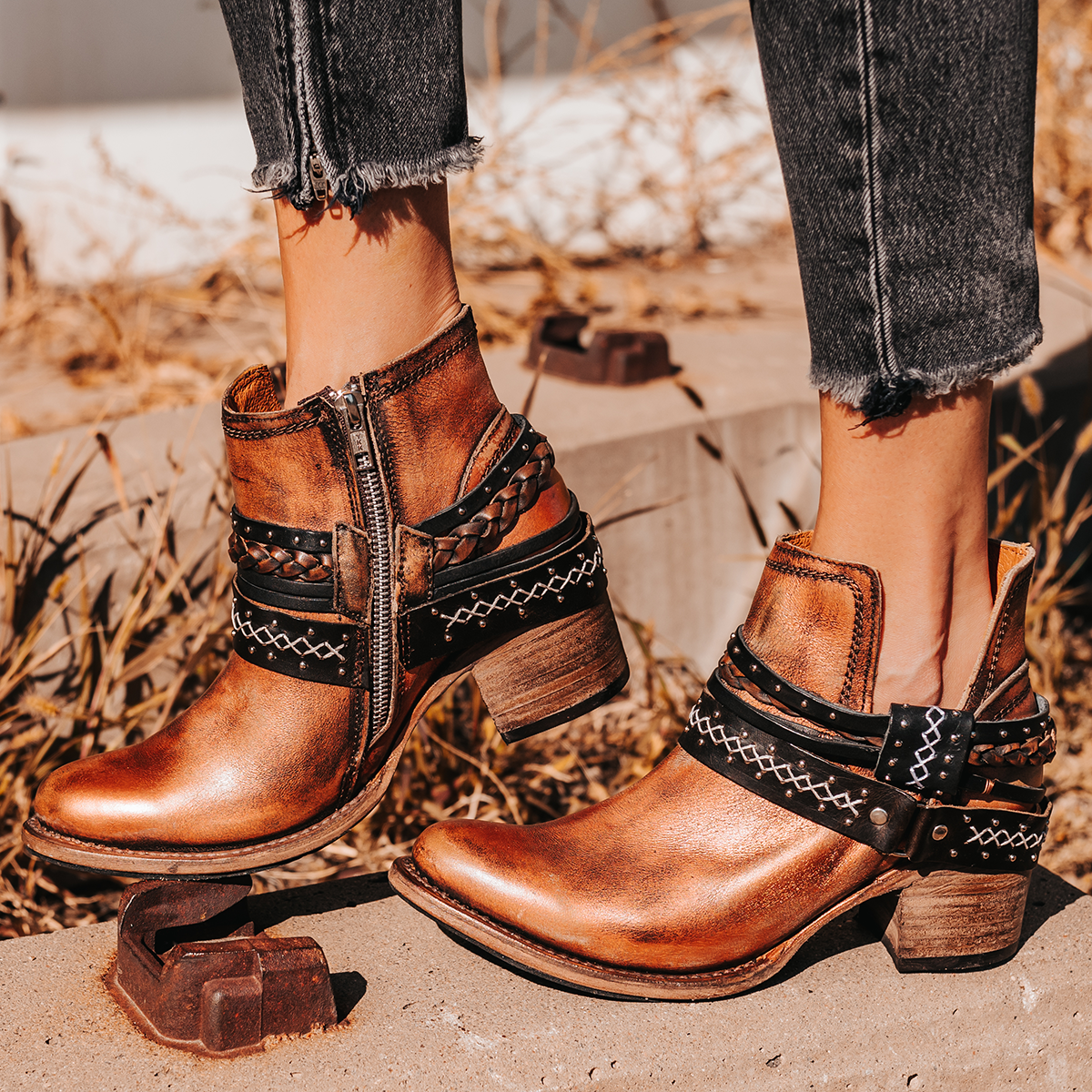 FREEBIRD women’s Sabelle bronze leather side cutout ankle bootie with embellished decorative belts