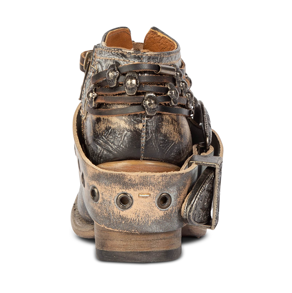 Back view showing low contrasting wood heel with western ankle belts on FREEBIRD women's Saloon graphite multi bootie