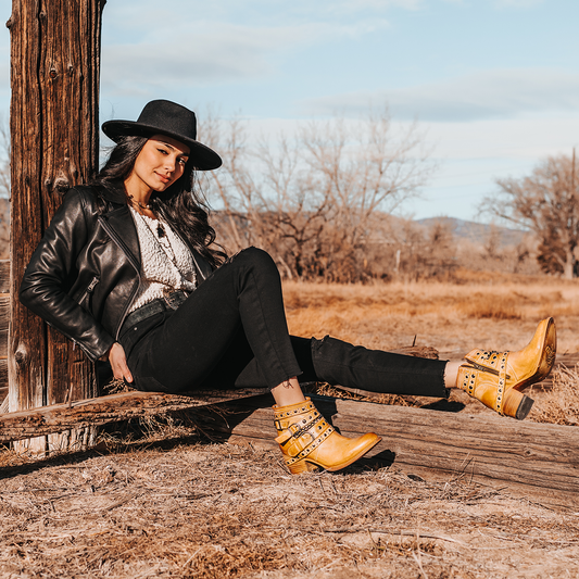 FREEBIRD women’s Sandra banana leather ankle bootie with silver stud detailing and adjustable metal buckles
