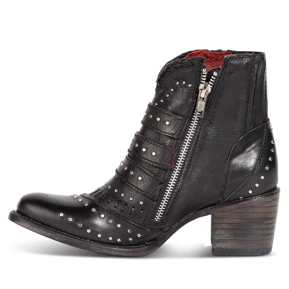 Inside view showing stud detailing and inside zipper on FREEBIRD women's Savanna black leather ankle bootie