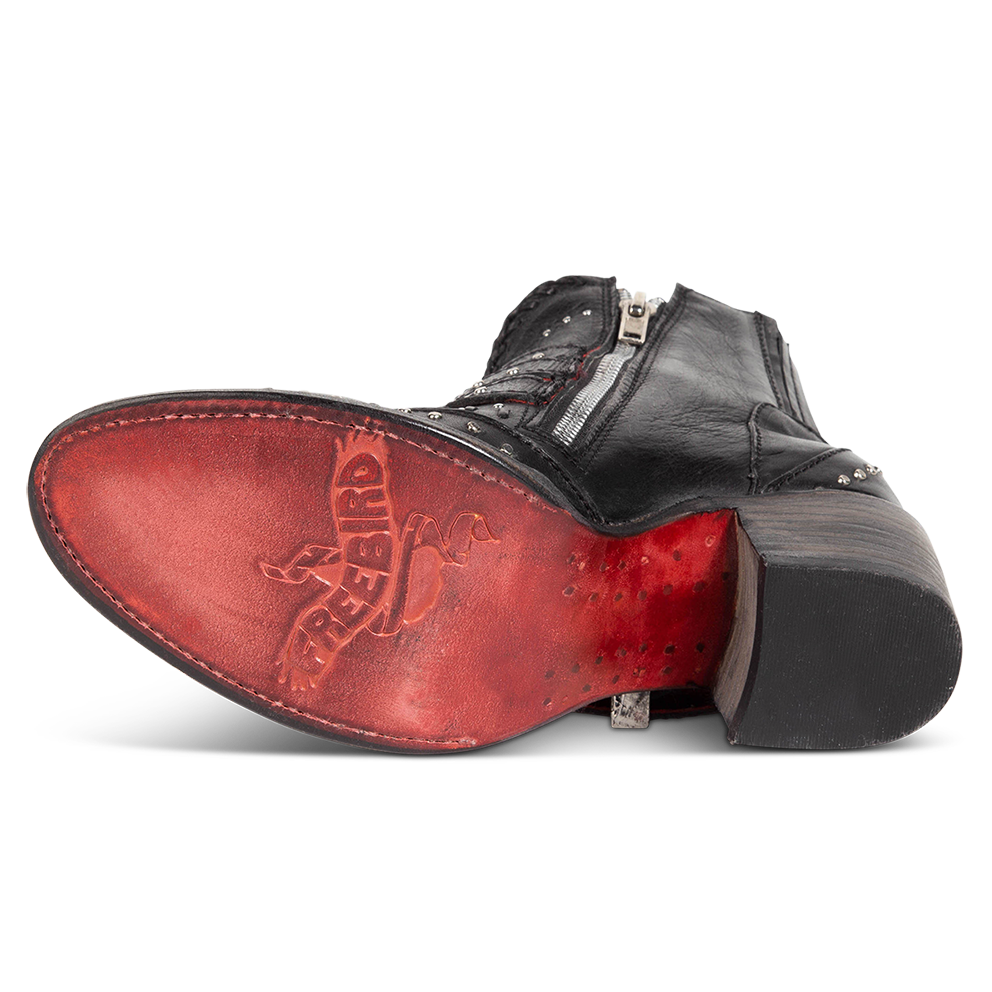 Leather sole imprinted with FREEBIRD on women's Savanna black leather ankle bootie
