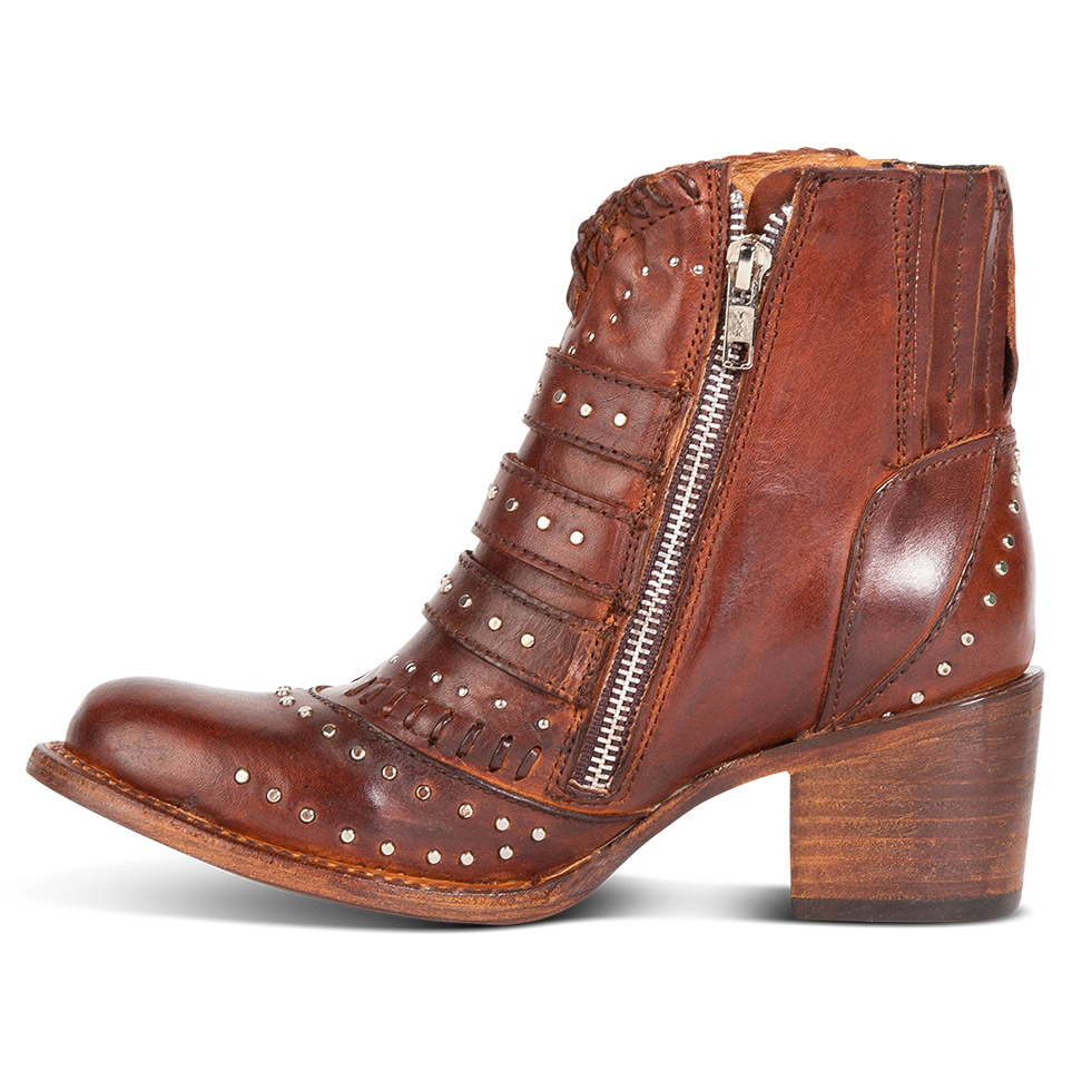 Inside view showing stud detailing and inside zipper on FREEBIRD women's Savanna cognac leather ankle bootie