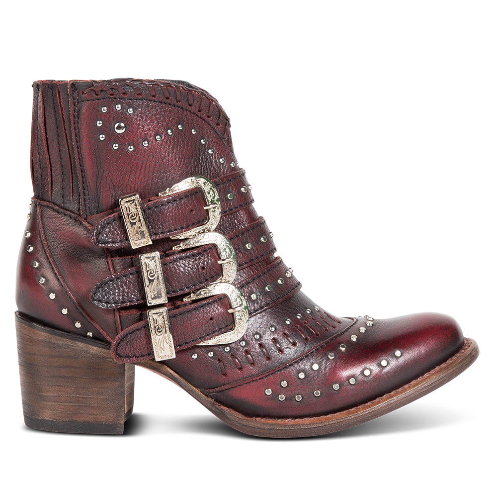FREEBIRD women's Savanna wine leather ankle bootie with silver studs, elastic gore, and metal buckles