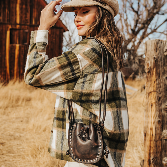 FREEBIRD Stella black distressed bag with silver clasp closure and adjustable leather shoulder straps