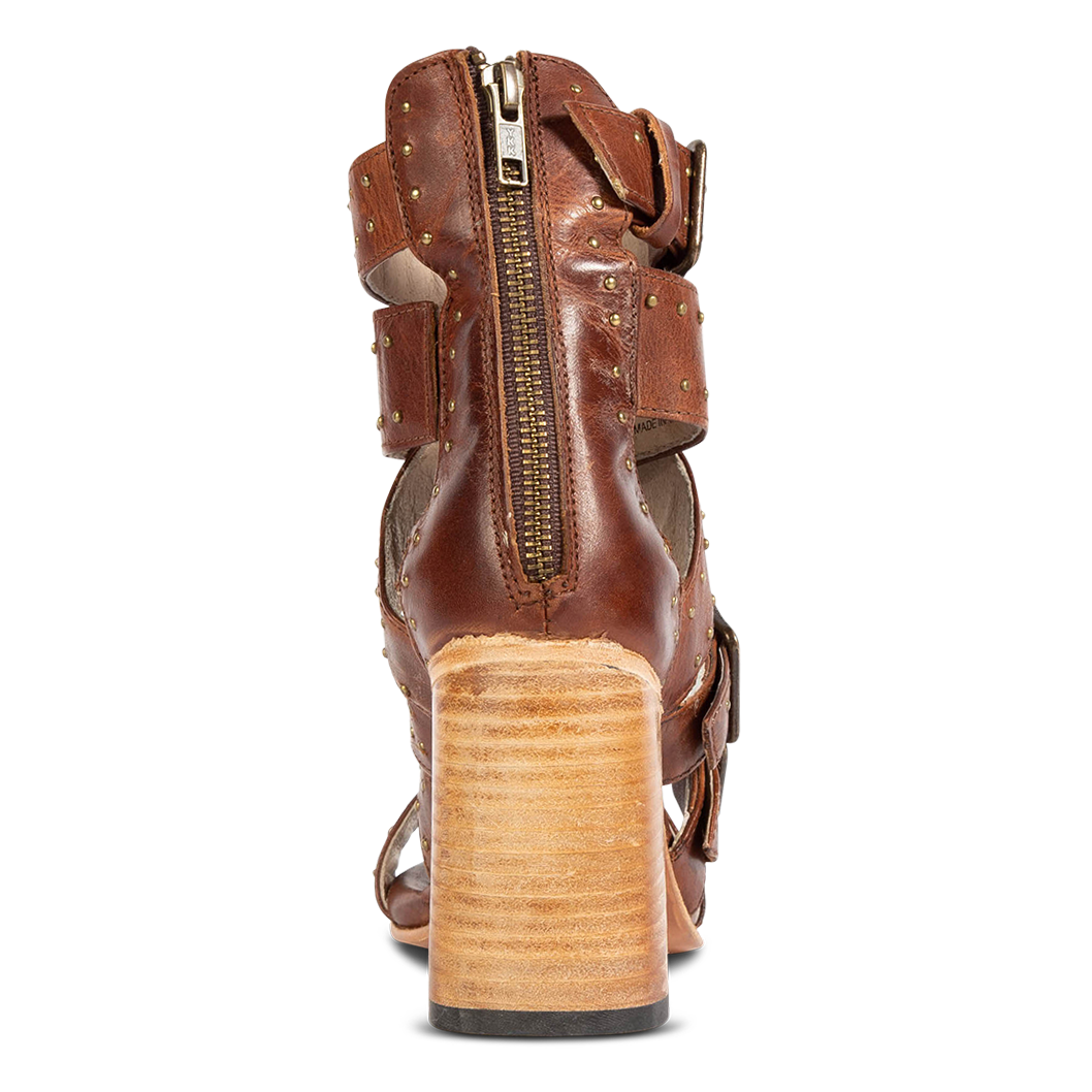 Back view showing studded leather and working zip closure FREEBIRD women's Tanica cognac sandal