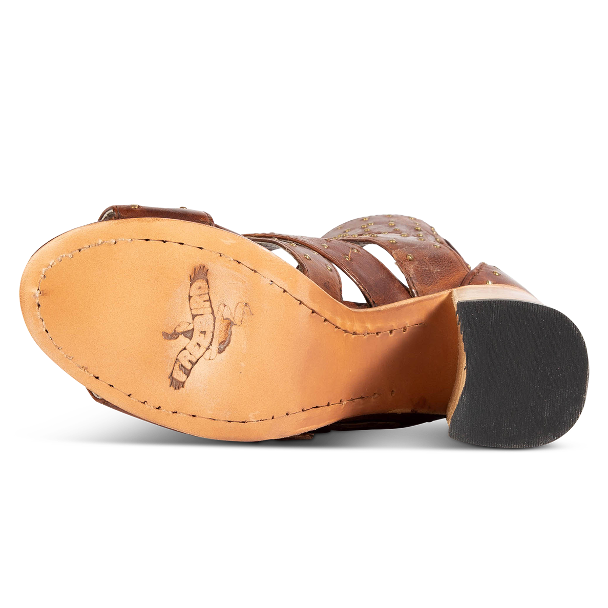Leather sole imprinted with FREEBIRD on women's Tanica cognac sandal