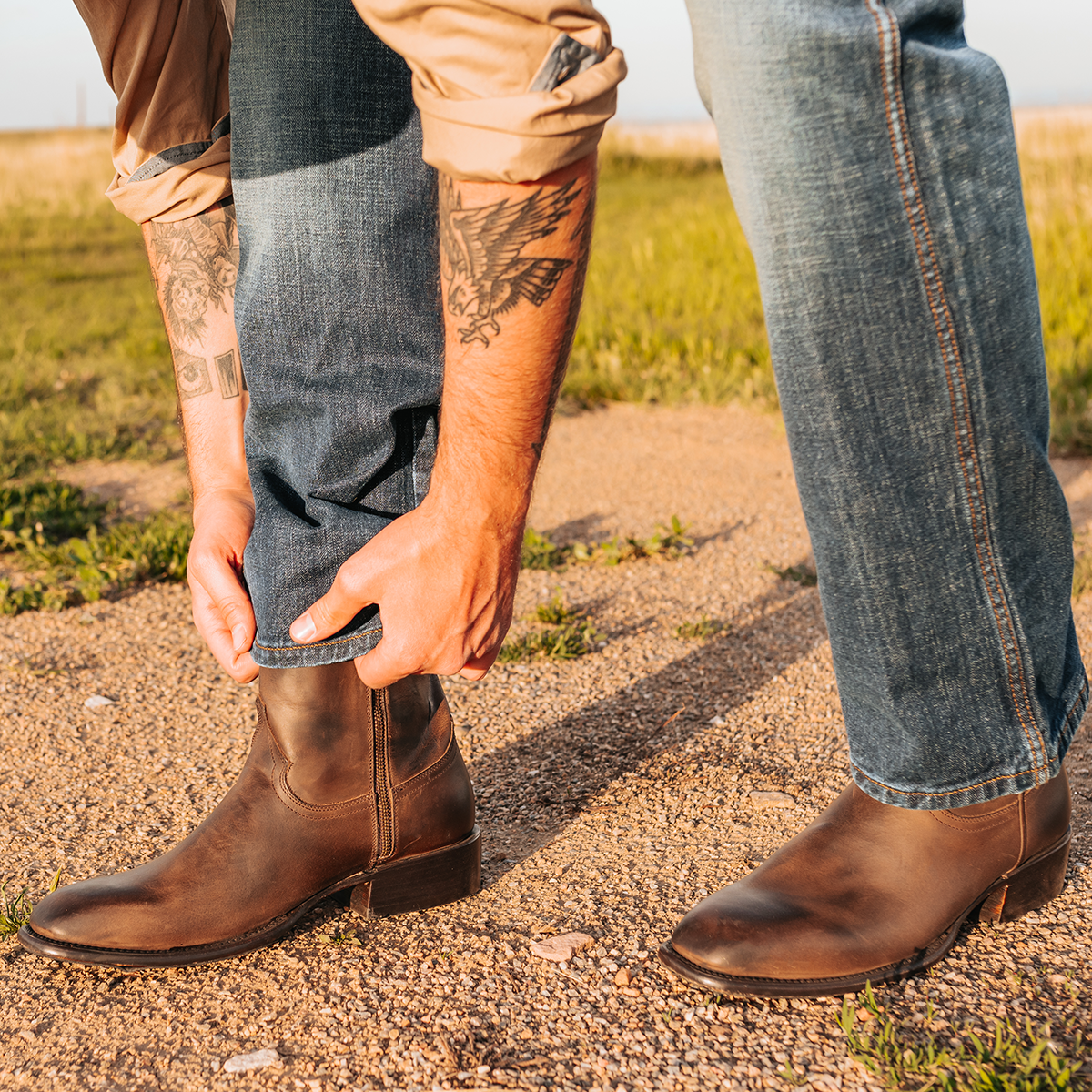 FREEBIRD men's Tifton brown single exterior pull strap, squared toe, and inside zip closure low heeled mid calf boot lifestyle