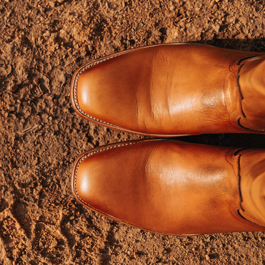 FREEBIRD men's Tifton camel single exterior pull strap, squared toe, and inside zip closure low heeled mid calf boot