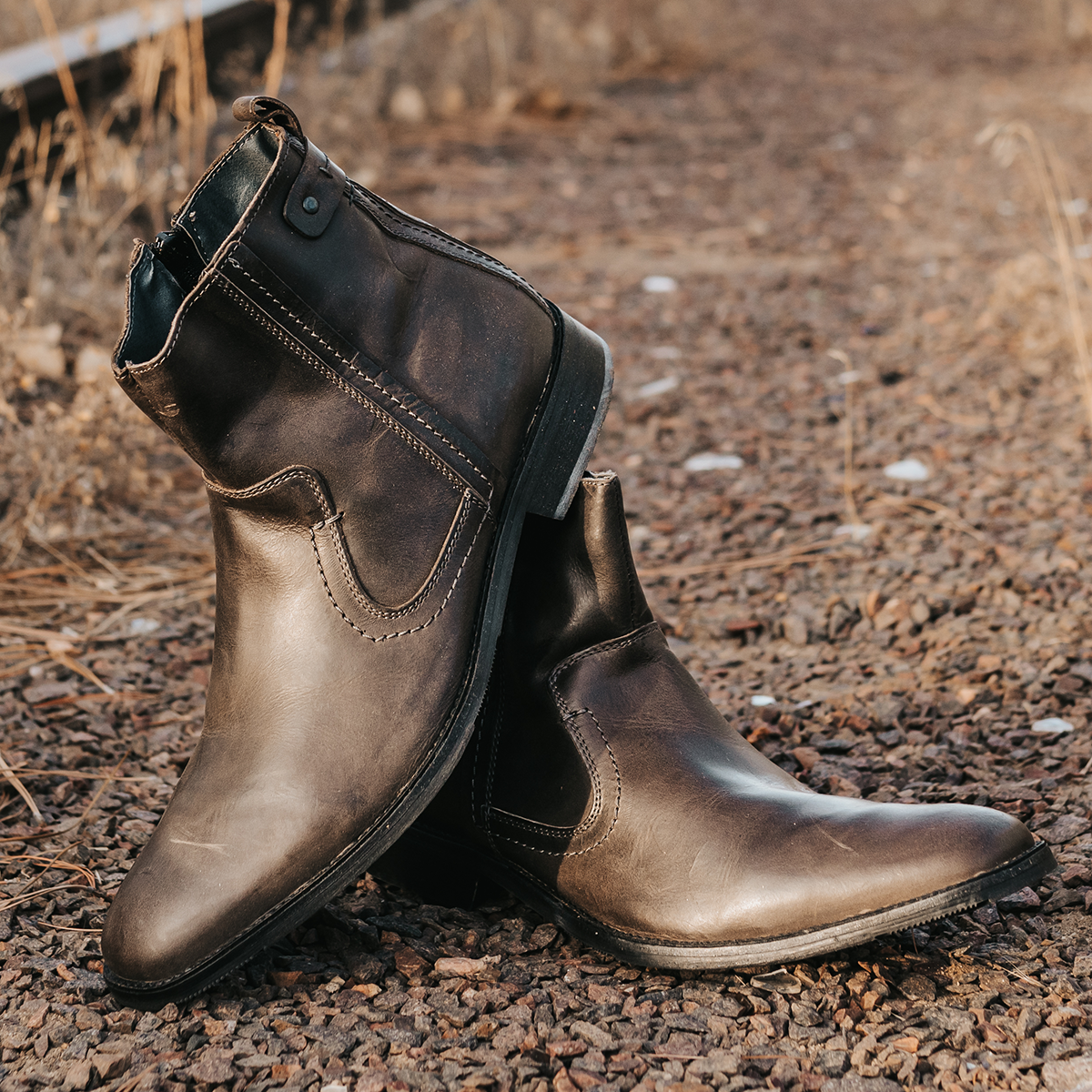 FREEBIRD men's Twist cognac featuring a hidden inside zip with almond toe