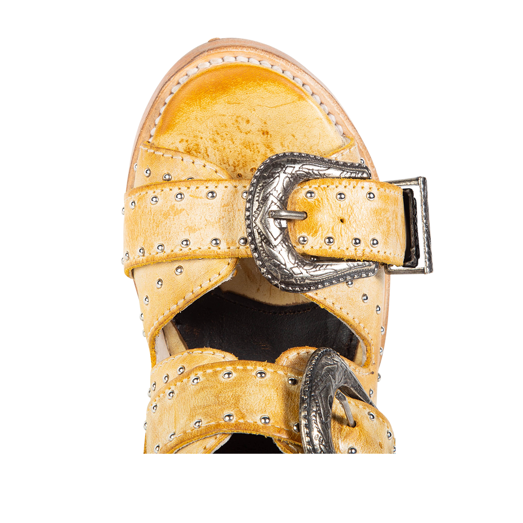 Top view showing open toe and engraved silver buckles on FREEBIRD women's Violet banana sandal