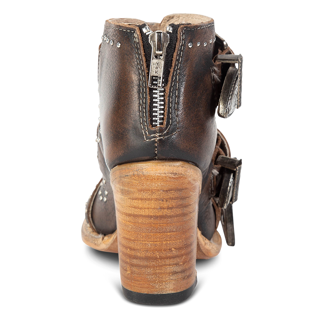 Back view showing working brass zip closure and leather heel on FREEBIRD women's Violet black sandal