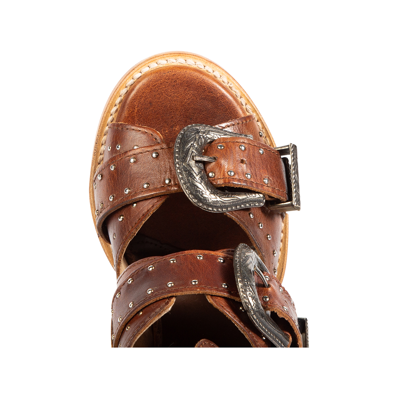 Top view showing open toe and engraved silver buckles on FREEBIRD women's Violet cognac sandal