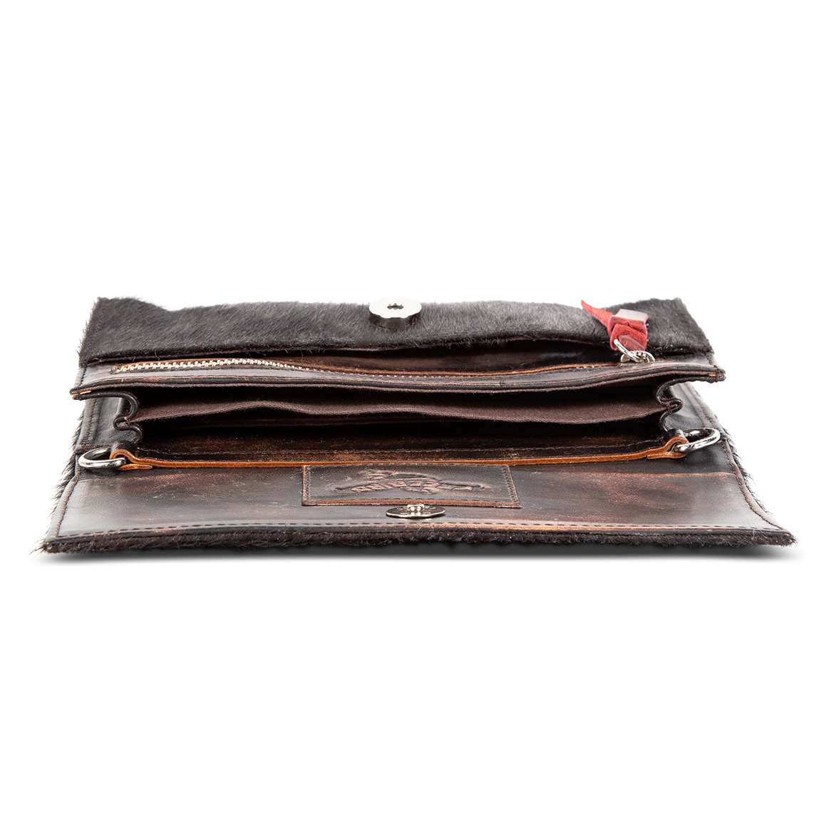 Interior fabric lined pockets and working brass zip closure on FREEBIRD Lola black clutch