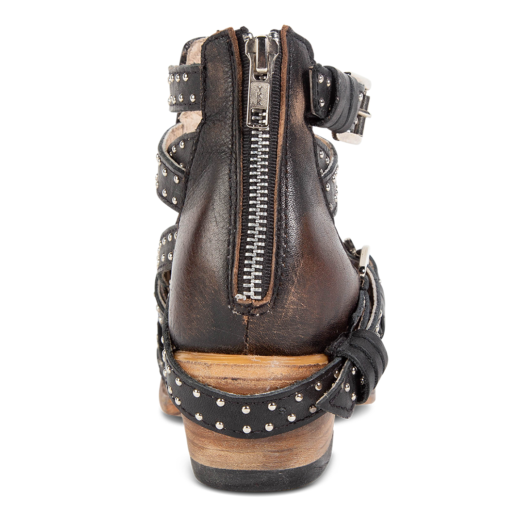 Back view showing zipper closure and mid heel on FREEBIRD women's Wasp black ankle bootie