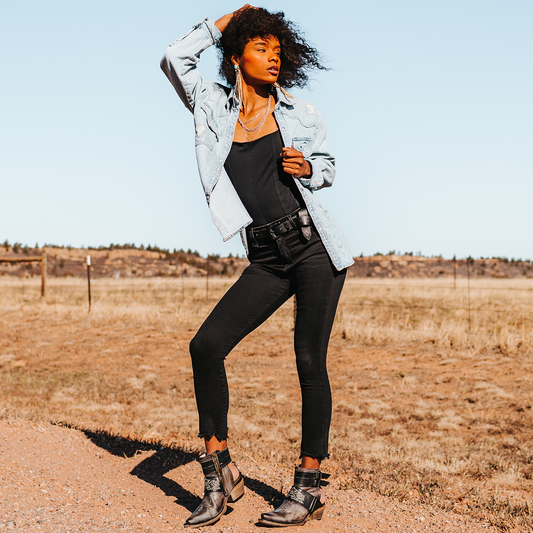 FREEBIRD women's Waylon stone multi shoe with exposed heel, metal buckles, working inside zip closure, and snip toe lifestyle