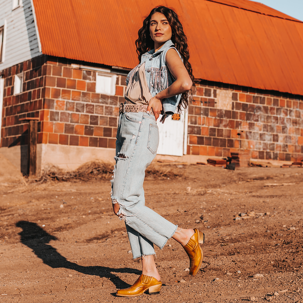 FREEBIRD women's Wentworth wheat western mule featuring elastic gore, stitch detailing, open back, and snip toe lifestyle