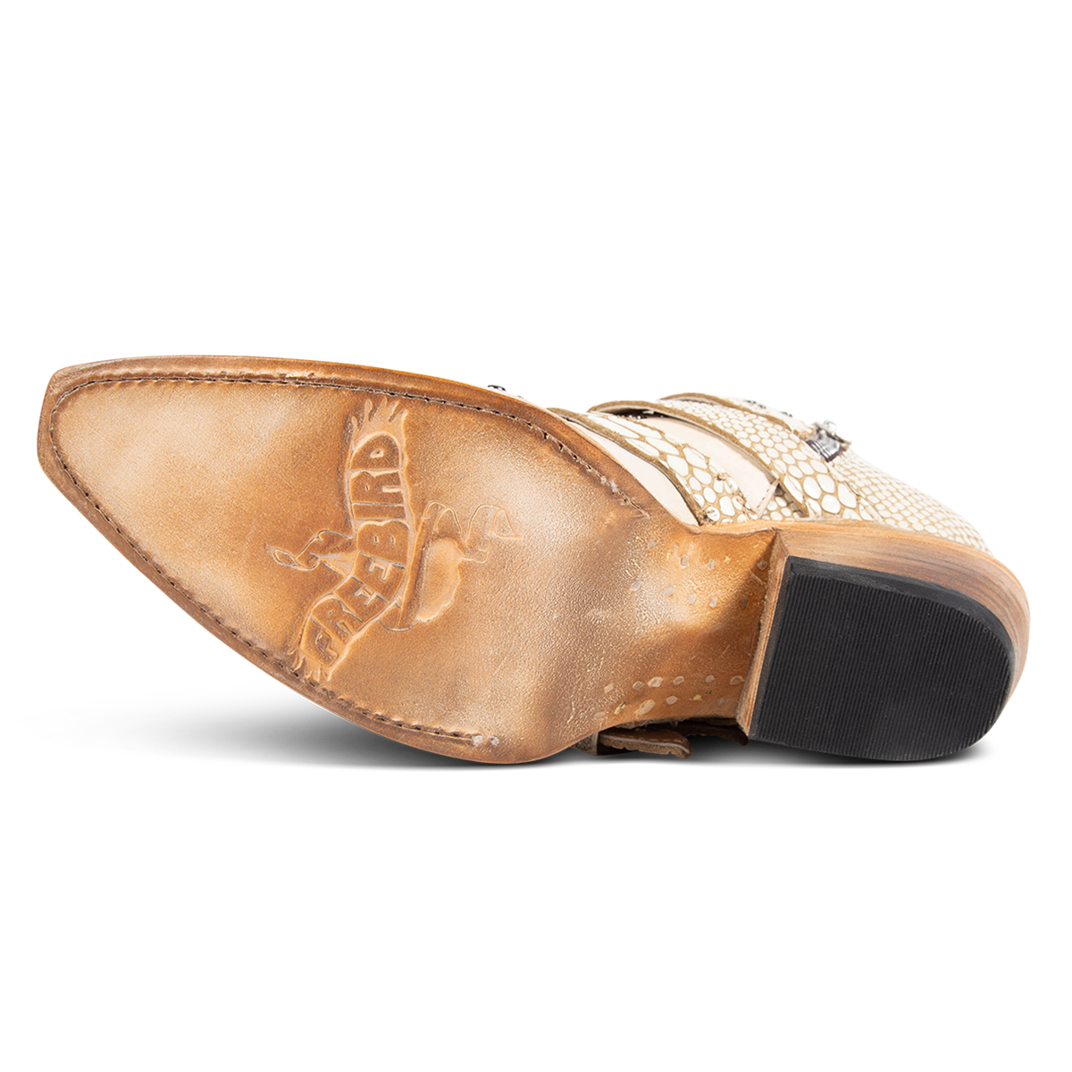 Leather sole imprinted with FREEBIRD on women's Whilhelmina white snake western ankle bootie