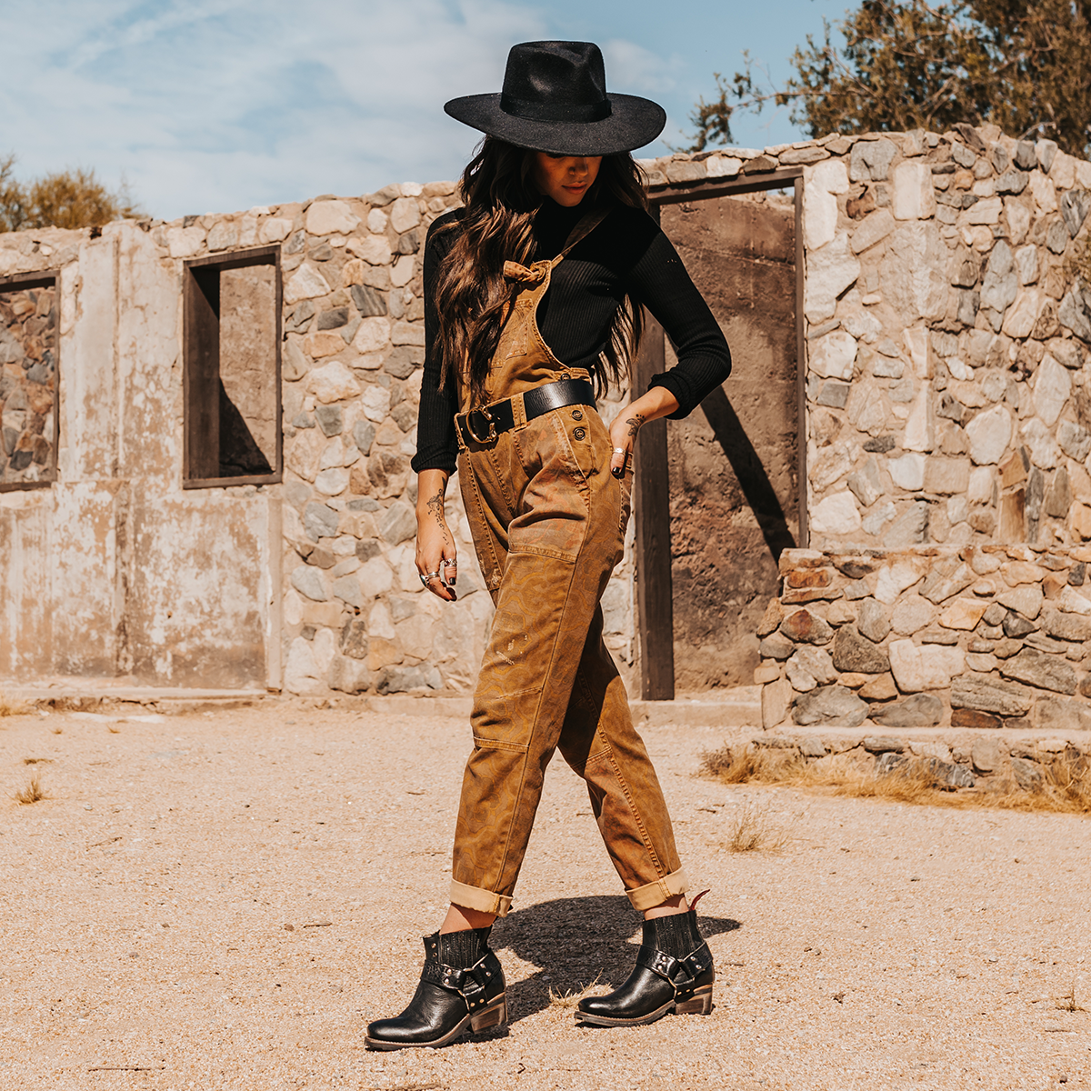FREEBIRD women's Whiskey black tire tread gore detailing ankle harness ankle bootie lifestyle image