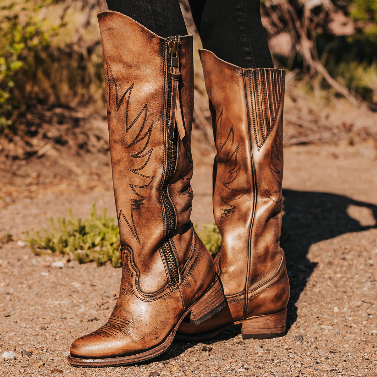 FREEBIRD women's Whisper bronze distressed boot with western shaft stitching and outer zip closure accent