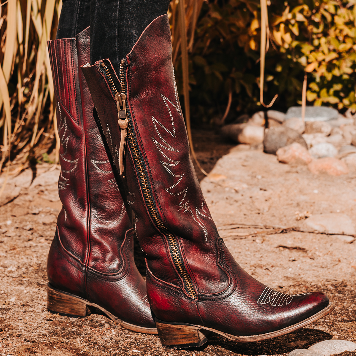 FREEBIRD women's Whisper wine boot with western shaft stitching and outer zip closure accent