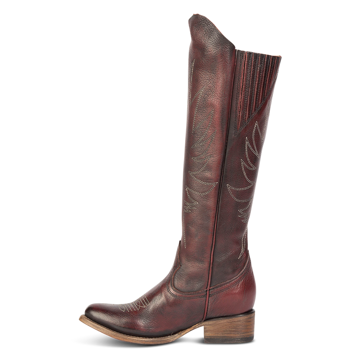 Inside view showing western stitch detailing and gore construction on FREEBIRD women's Whisper wine tall boot