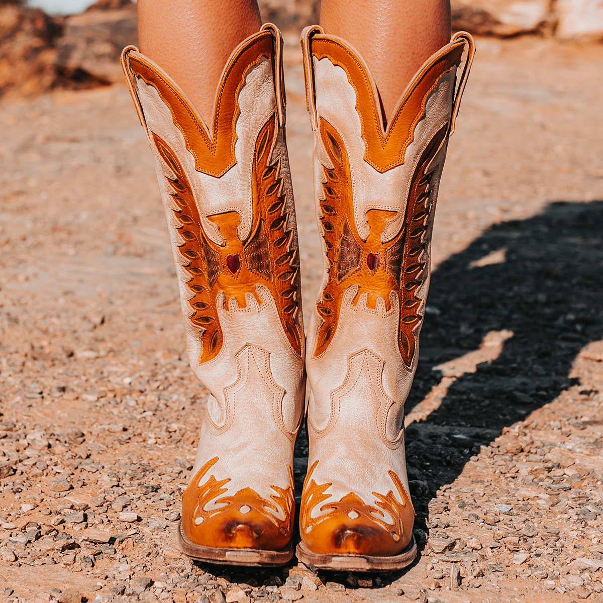 FREEBIRD women's Willie beige multi leather western boot with textured design, stitch detailing, and snip toe construction