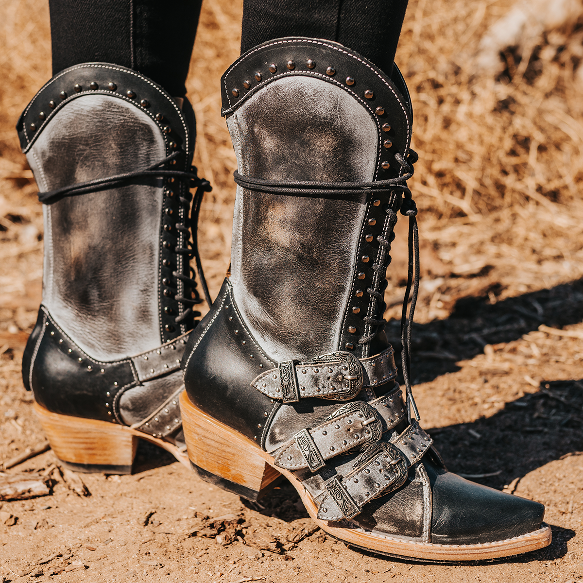 FREEBIRD women's Winnie ice multi boot featuring a lace up shaft, leather accents, and a back brass zip closure