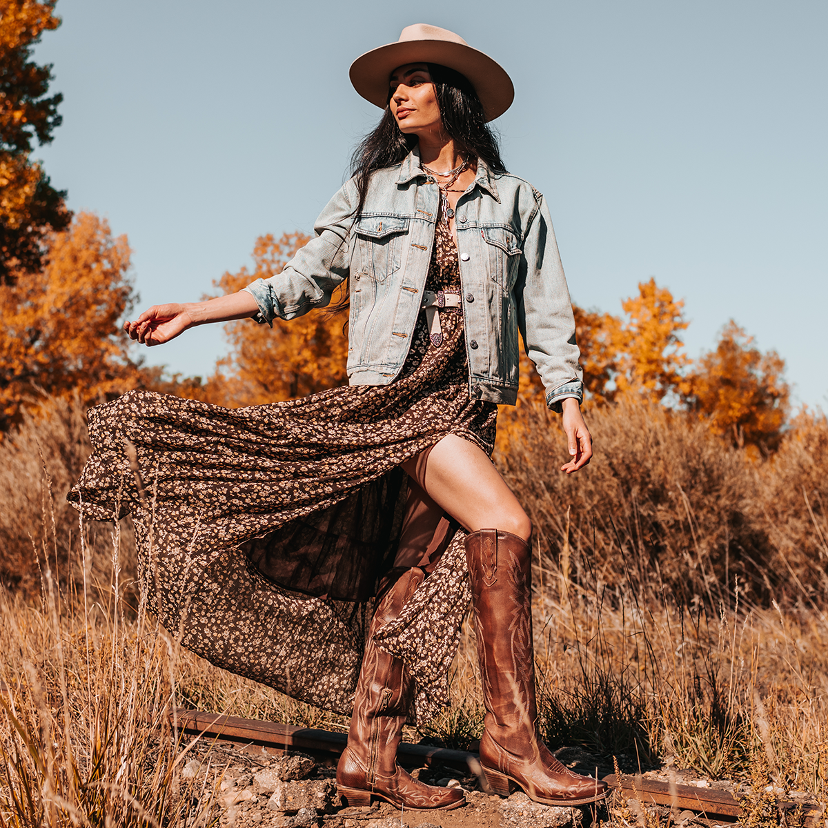 FREEBIRD women's Wonder brown tall leather western boot with stitch detailing and traditional snip toe construction lifestyle