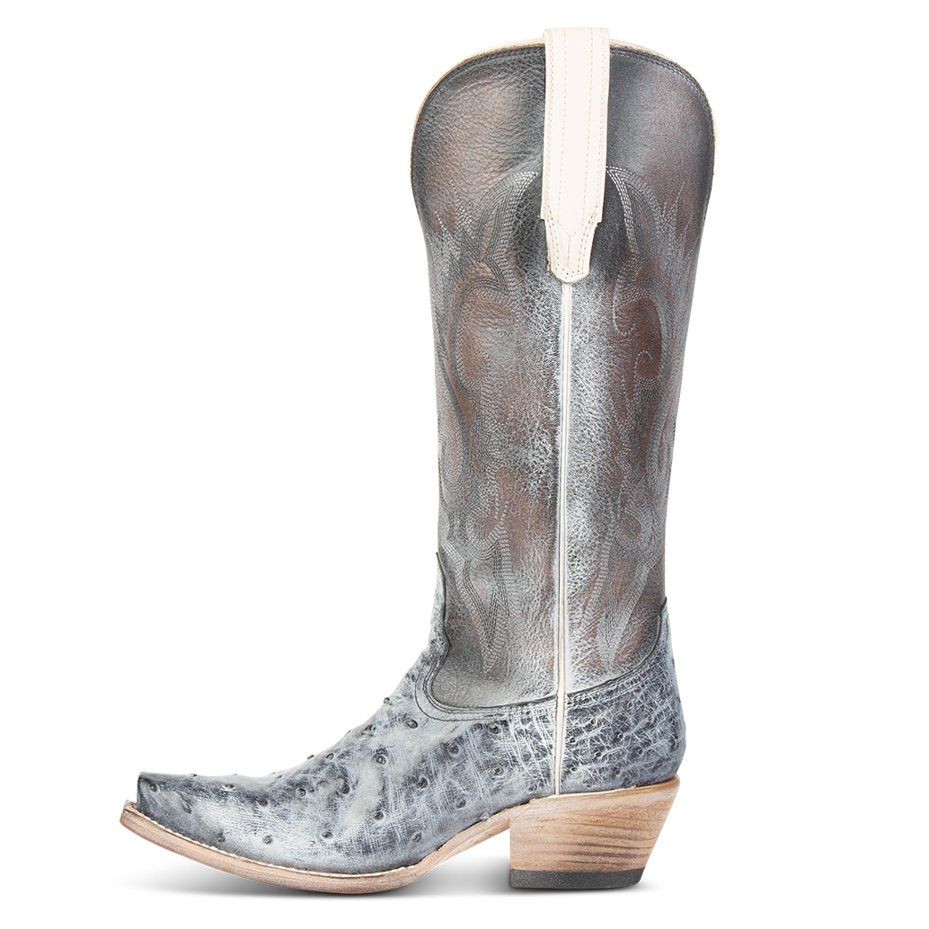 Side view showing leather pull straps and western stitch detailing on FREEBIRD women's Woodland ice ostrich leather boot